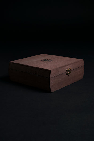 Luxury handcrafted wood box with Helius Originals logo, elegant eco-luxury packaging for cocktail smoker gift sets