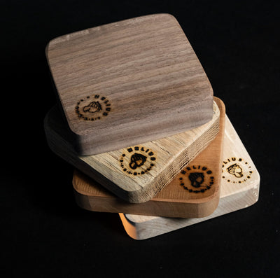 Set of Artisanal Aroma Boards handcrafted from 100% Ontario premium wood, used for smoked cocktails and gourmet mixology experiences.